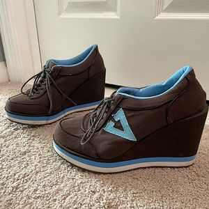 Size 10 women’s dark brown and sky blue 4’ platform sneakers by Volatile Kicks
